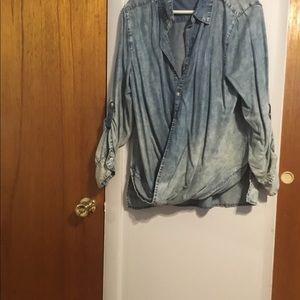 Women’s long sleeve denim blouse.